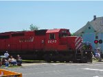 CP 6042 WB interrupts the 4th of July parade